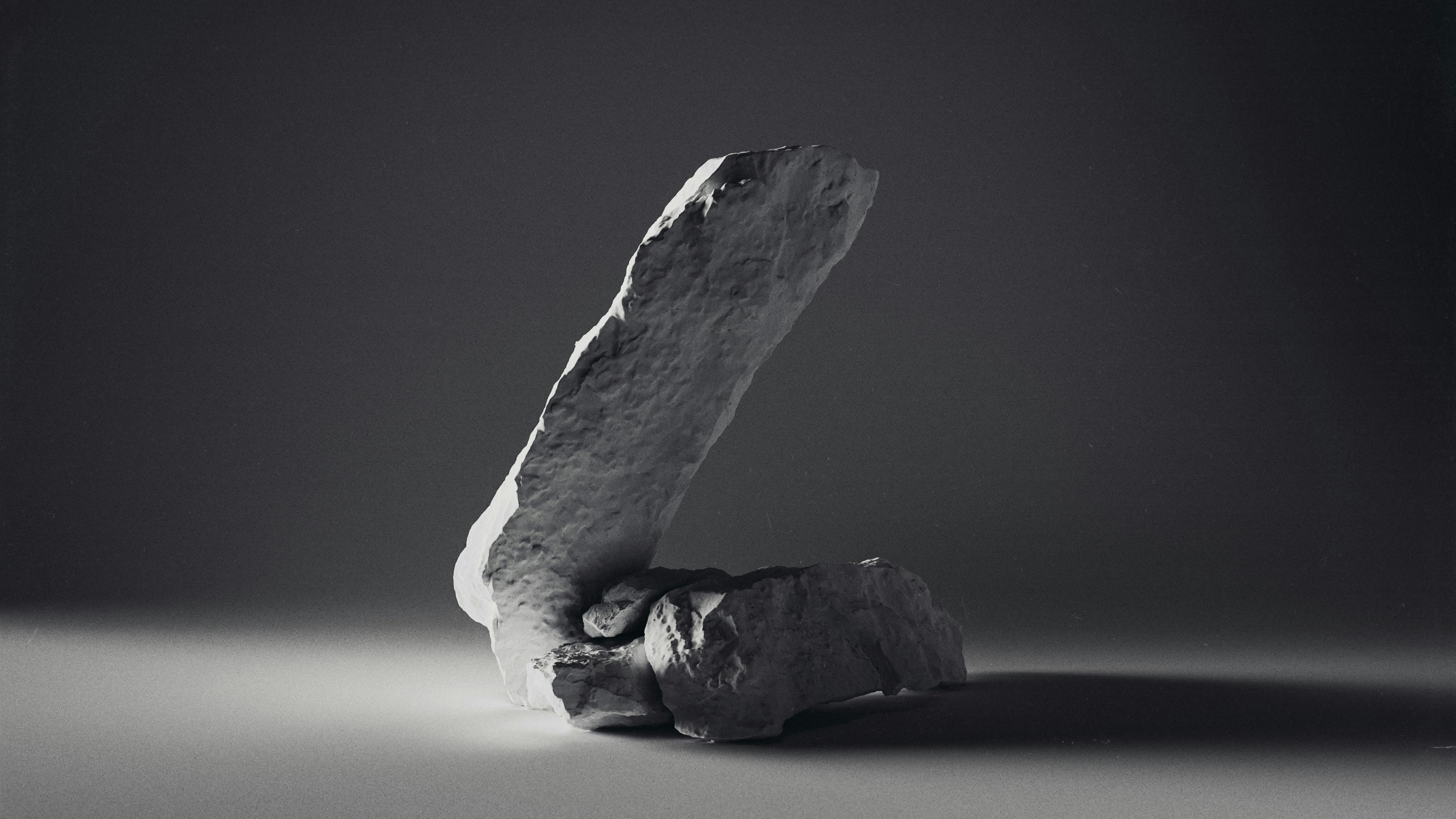A black and white photo of a rock